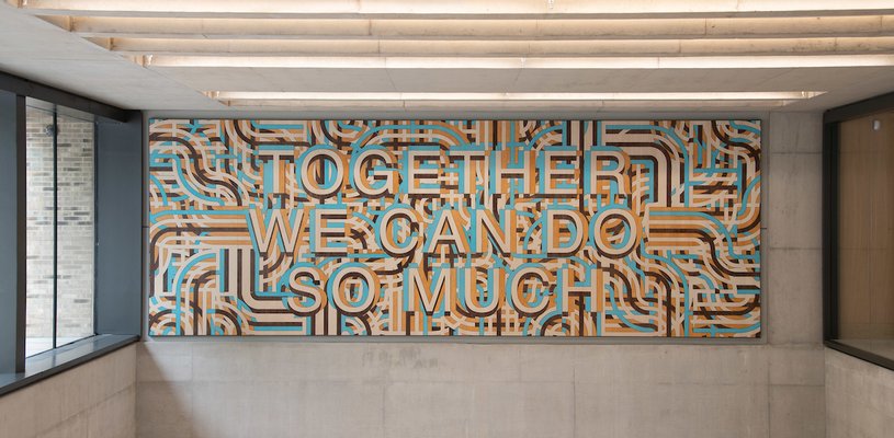 An artwork displayed above the main lab in the ZCR reads Together we can do so much