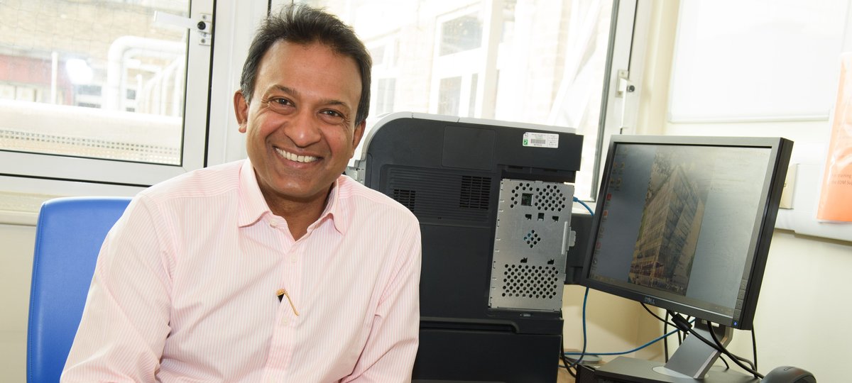 Photo of Bobby Gaspar at his desk