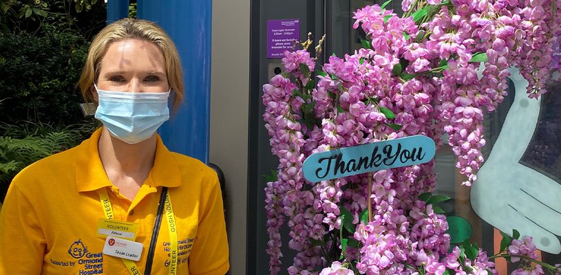 GOSH Volunteer Clare outside the hospital entrance