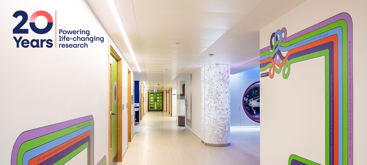 Bright and light corridor showing rainbow lines and space theme.