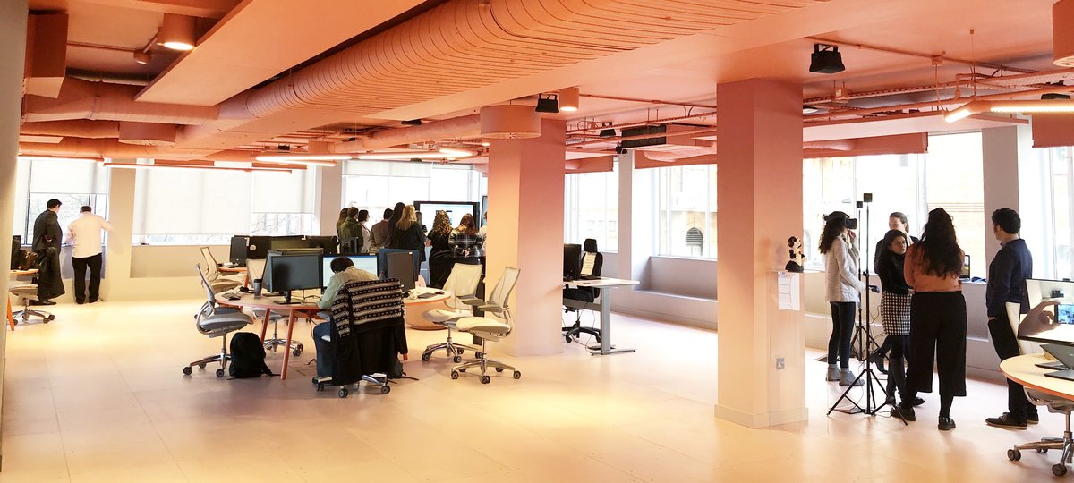 Photograph of DRIVE unit offices with people working