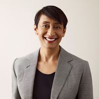 A woman smiling