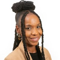 A woman smiling at the camera.