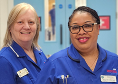 A picture of two nurses smiling