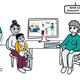 A family sitting at a computer screen with hospital staff