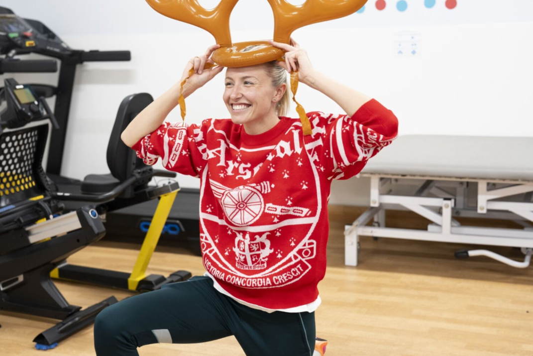 arsenal women player wearing inflatable antlers