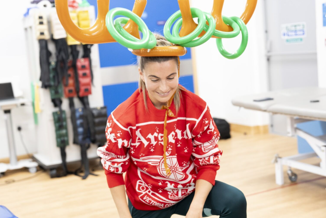 arsenal women player wearing inflatable antlers